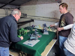 Tom (left) and Colin battle for the right to level yet another city in the name of the dark gods!