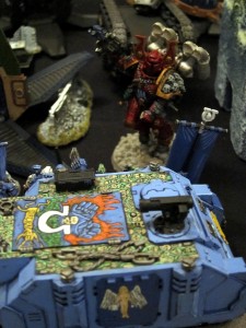 One of Steve's Demon Princes tries to ruin the paintjob on Jon's awesome Command Rhino!