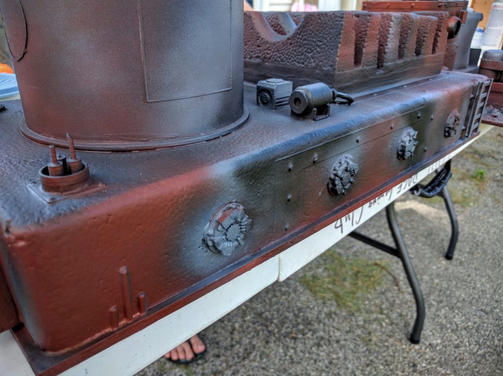Hatches on the back of the pump station base coated.